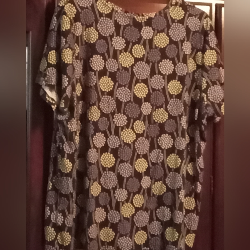 Plus size women's shirt. Dark blue background with light blue/white pattern